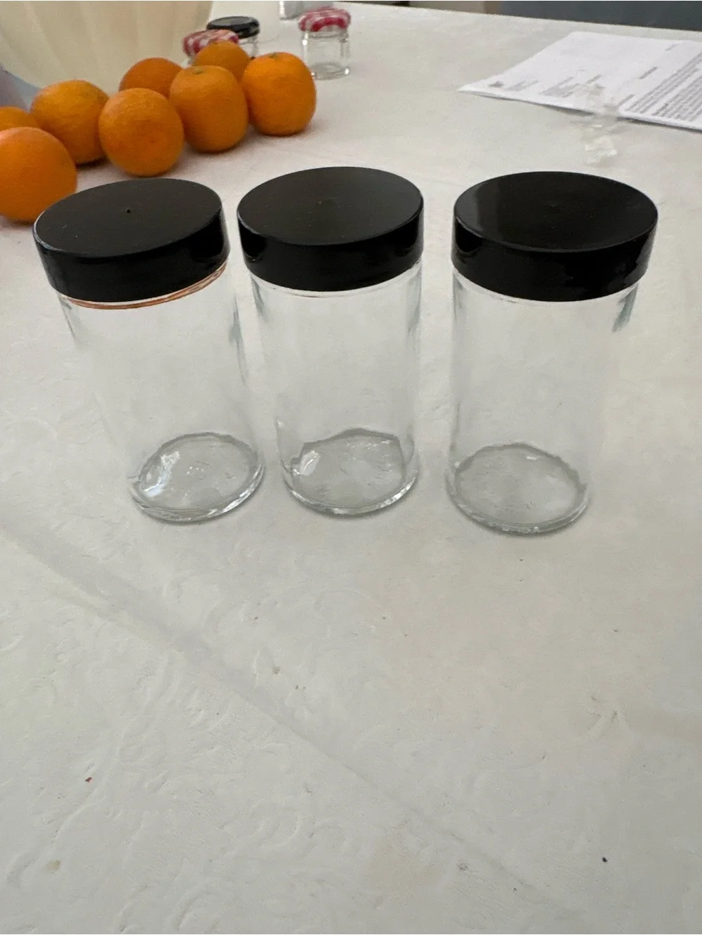 Set of 6 plastic spice holders with black, sparkly lids, 3 glass holders w/lids